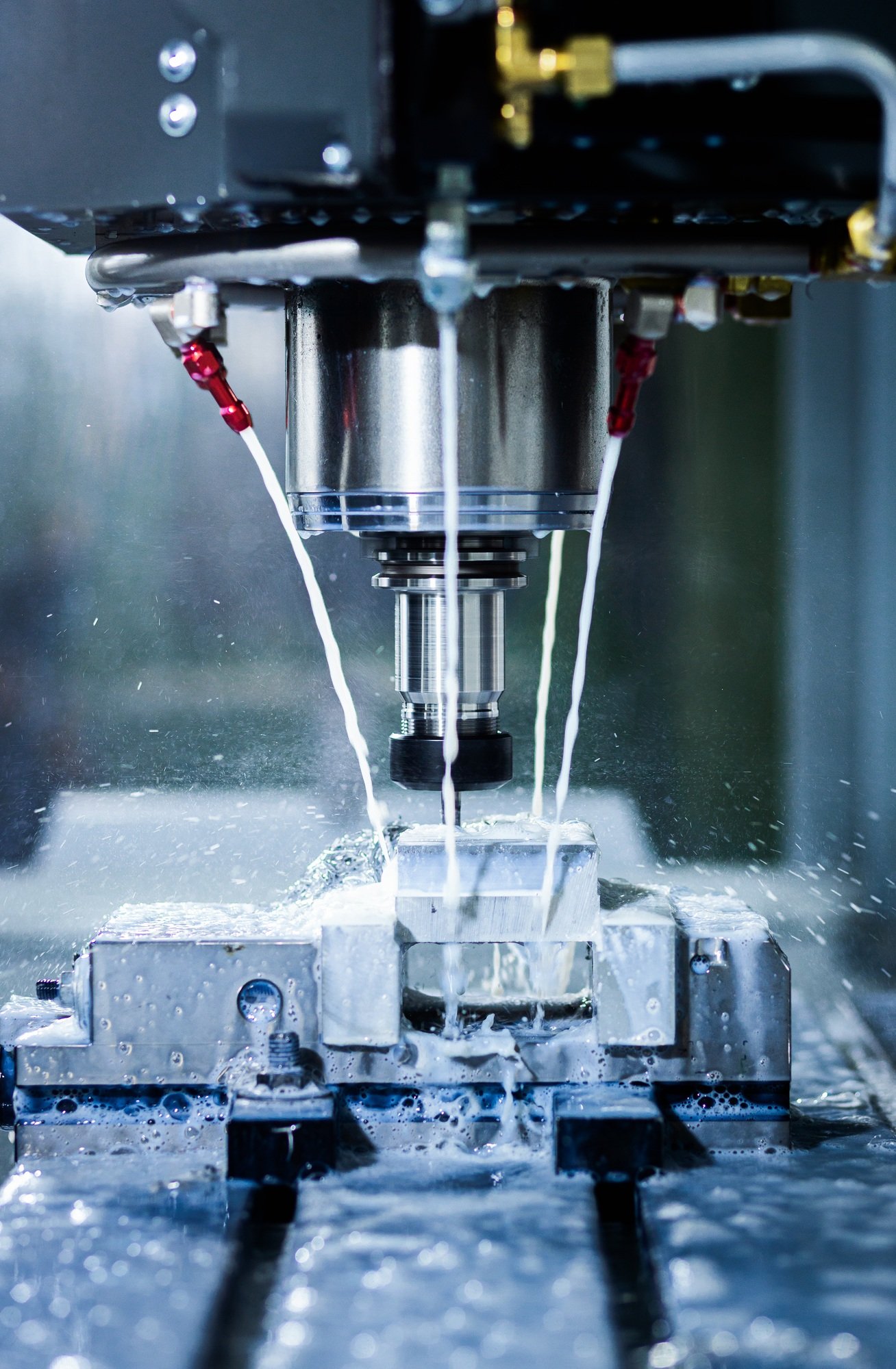 Close up of CNC machine cutting metal.